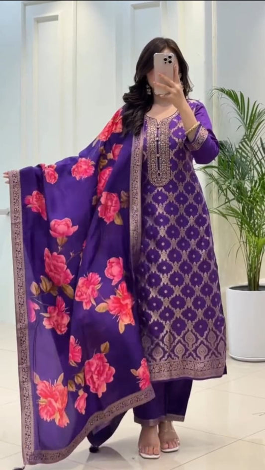 Banarasi Silks Suit which is beautifully decorated with a Banarasi Works